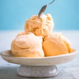 3 scoops of french vanilla ice cream in a bowl
