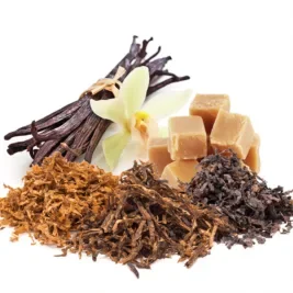 piles of various tobacco, vanilla beans and cubes of caramel.