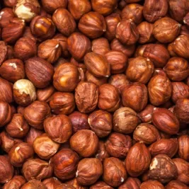 Pile of fresh roasted hazelnuts.