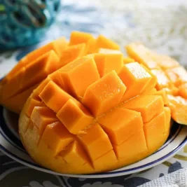 sliced mango on a plate.