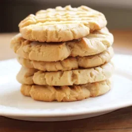 Stack of cookies on a plate.